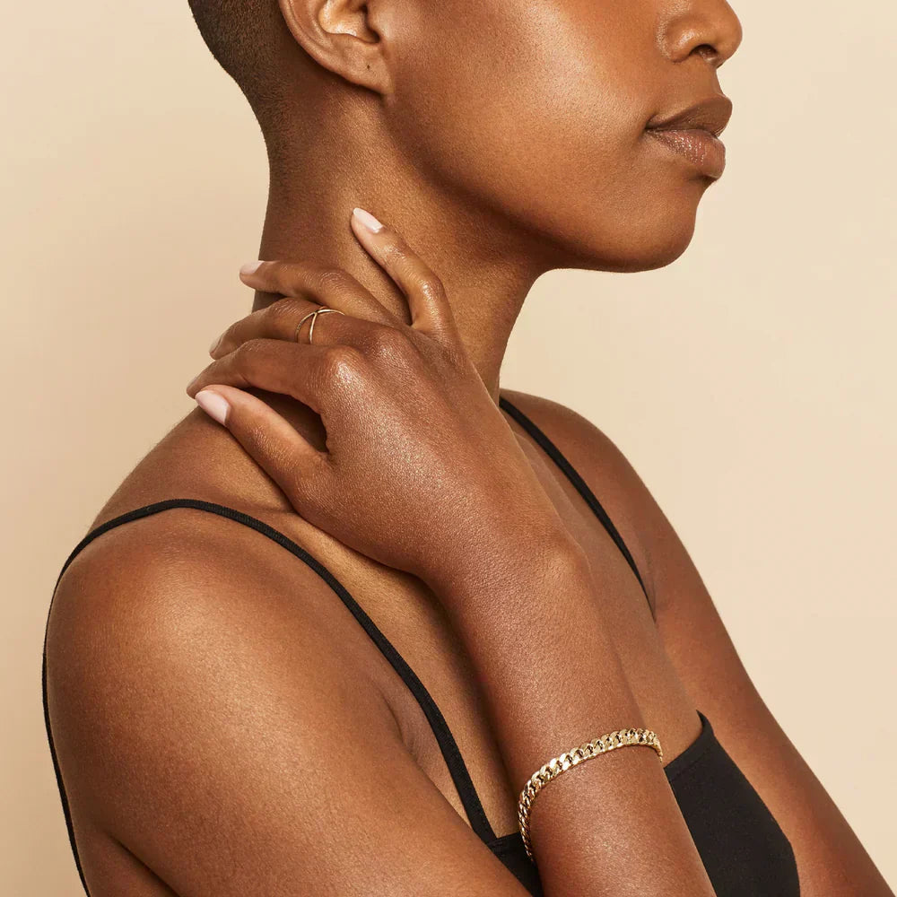 Ejendom Cuban-armband i guld