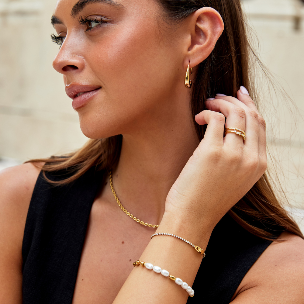 Kristallarmband i Guldton