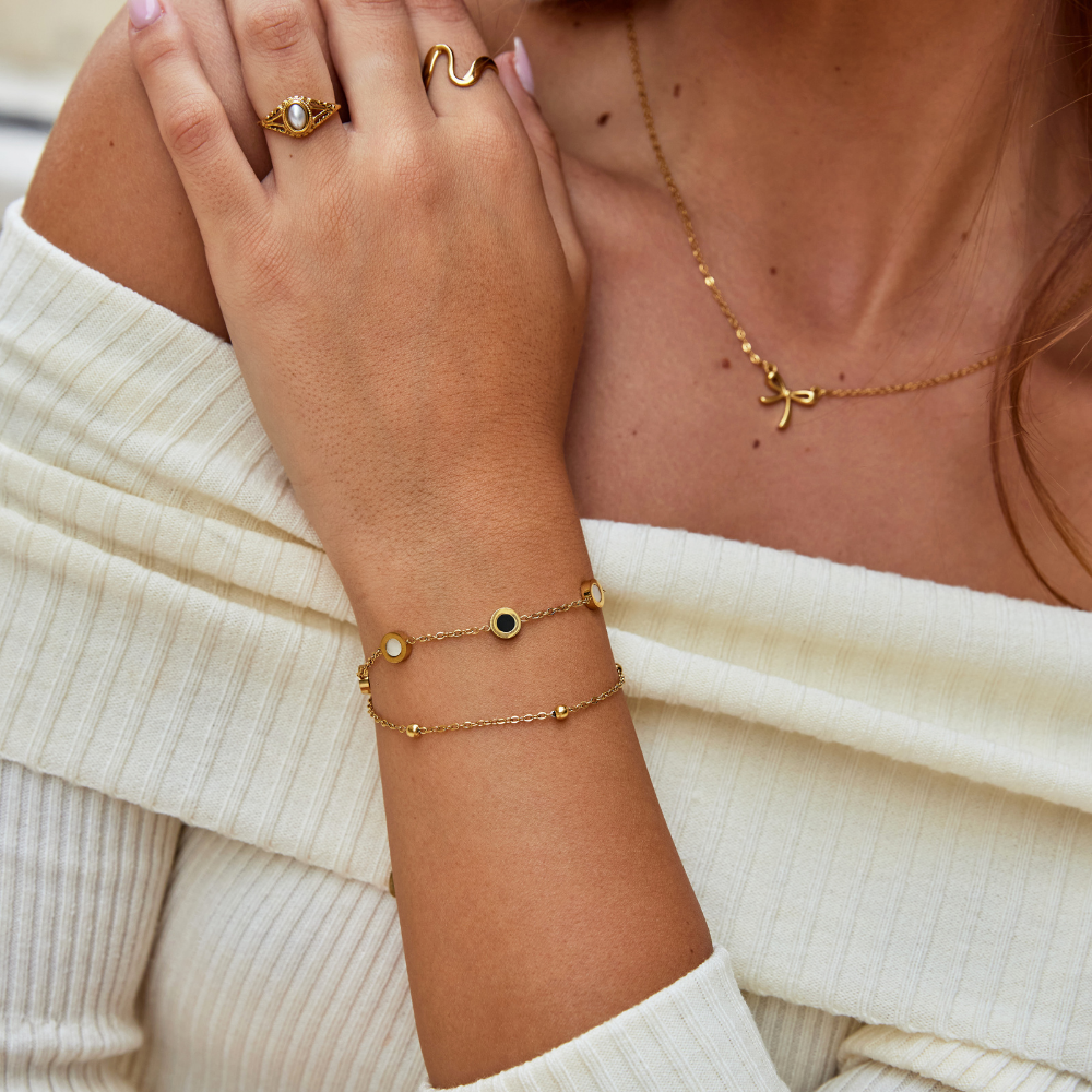 Onyx & Vit Mineralarmband