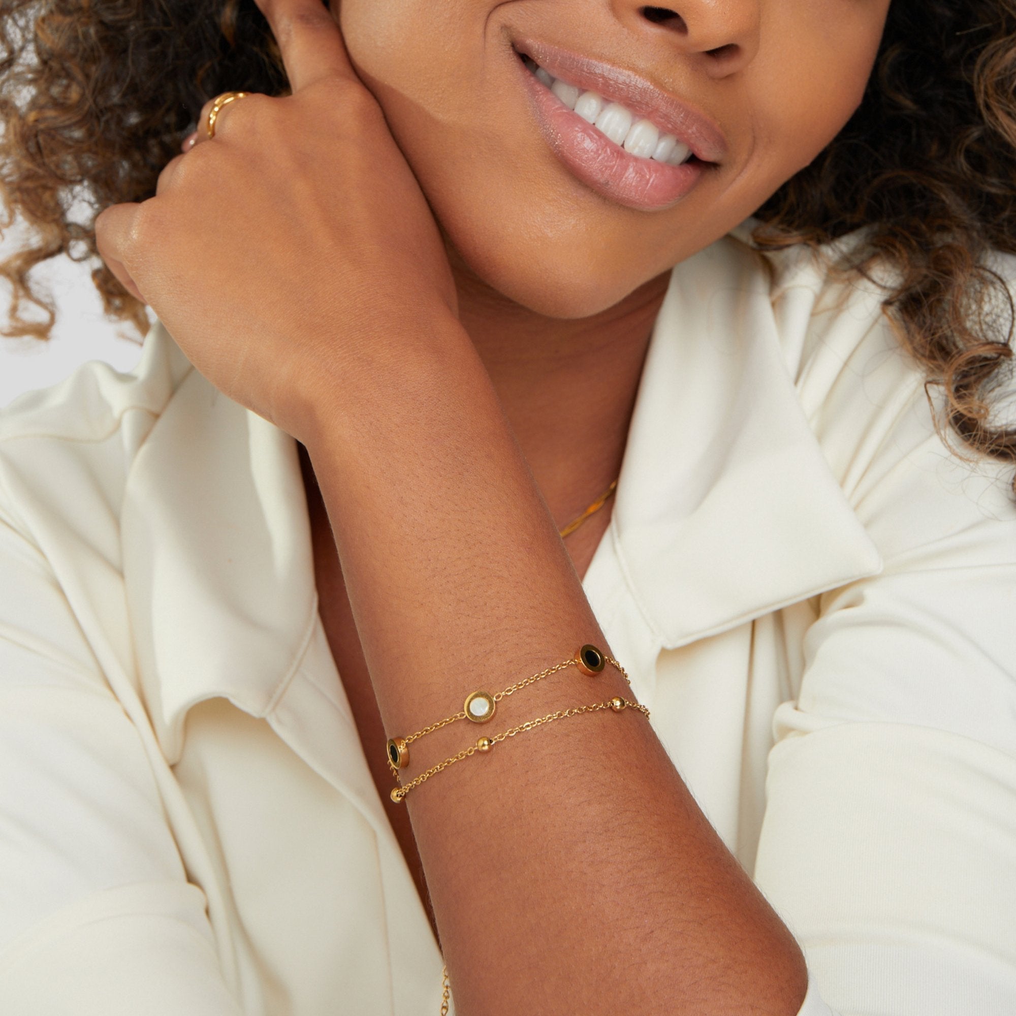 Onyx & Vit Mineralarmband